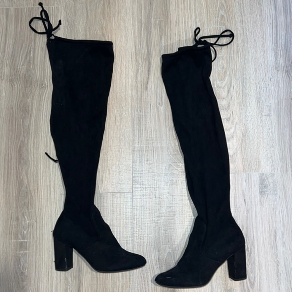 Francesca’s knee-high black boots